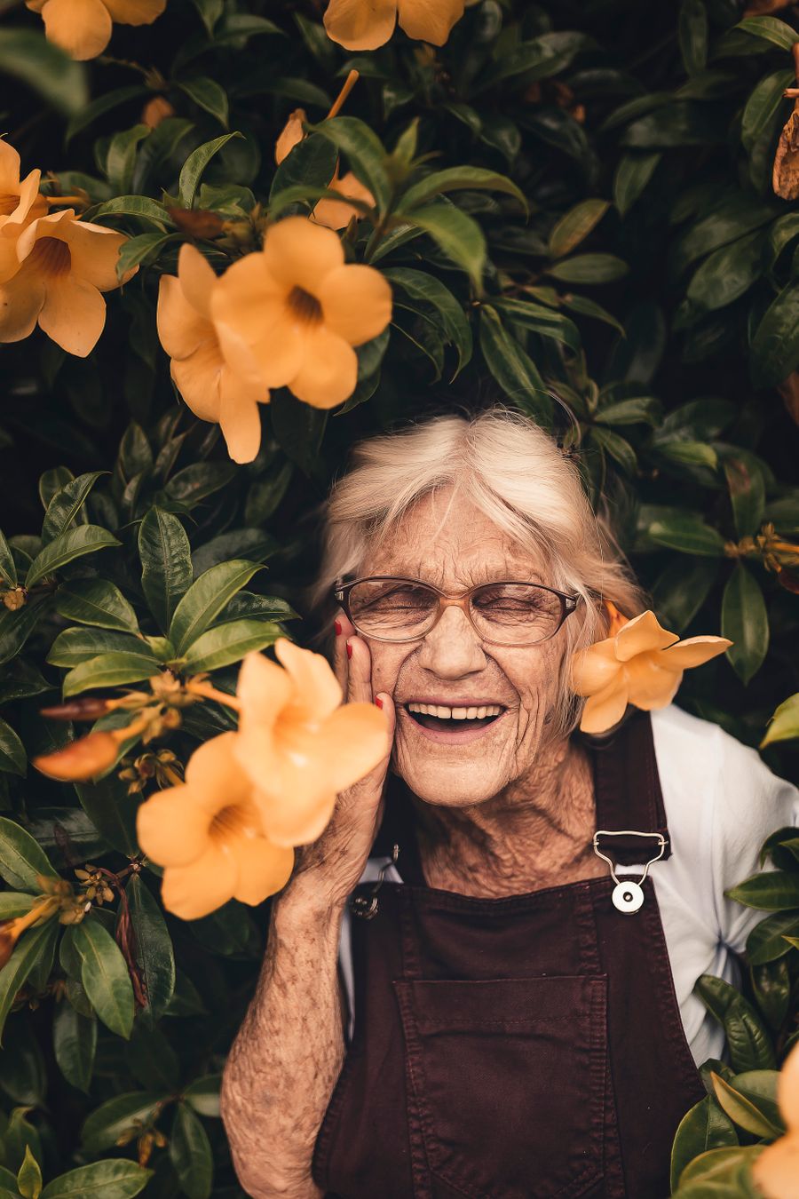 A joyful senior woman enjoying life outdoors